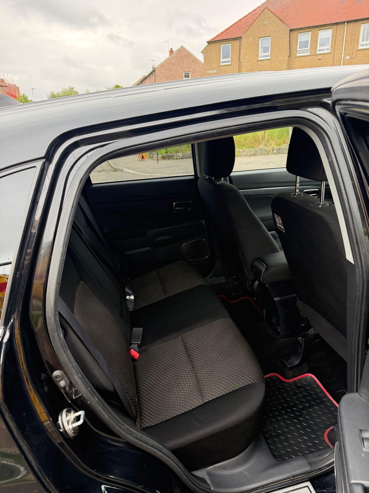 After: the same rear seats and carpets deep cleaned