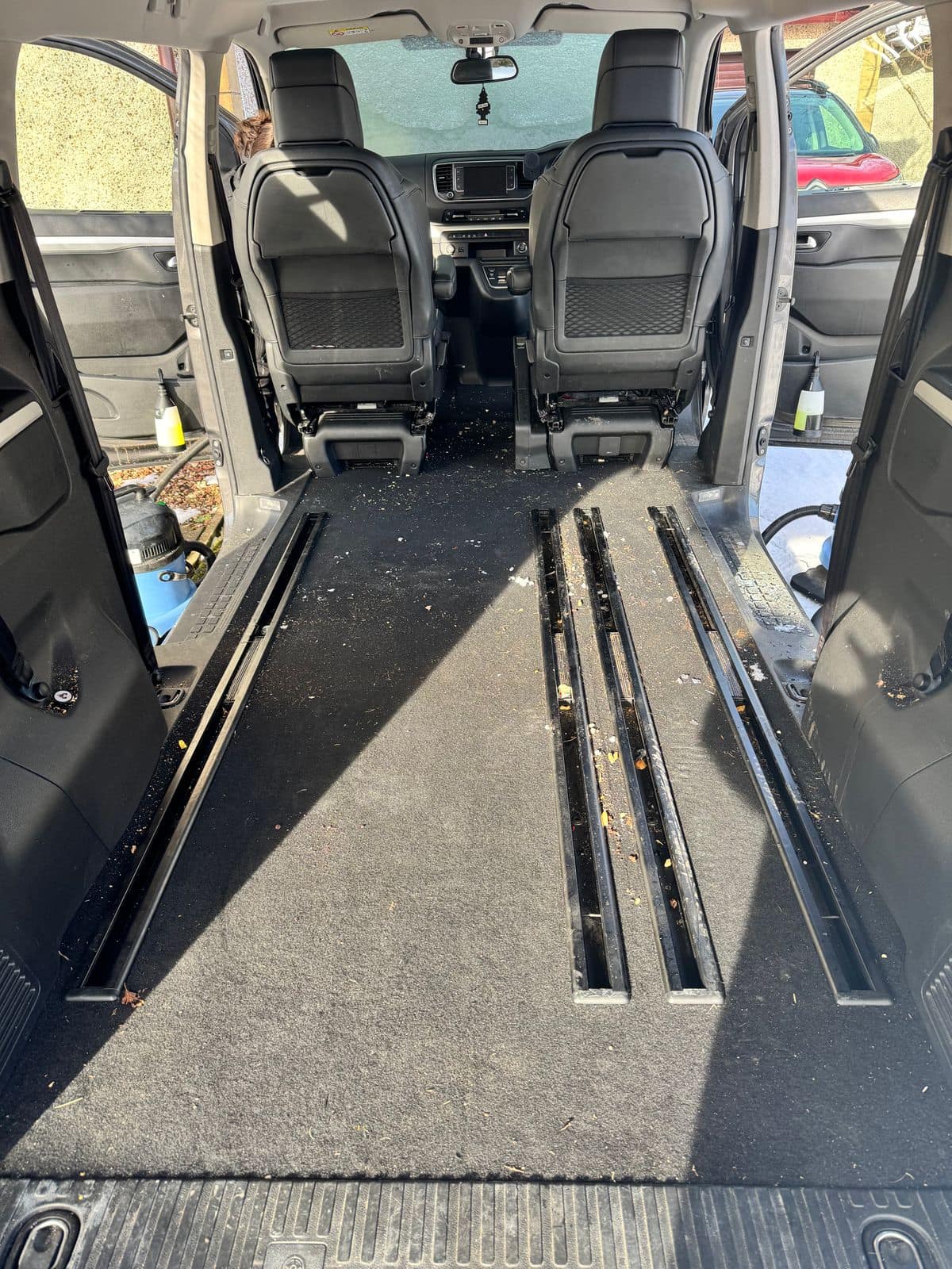 Before: van load floor dusty and marked